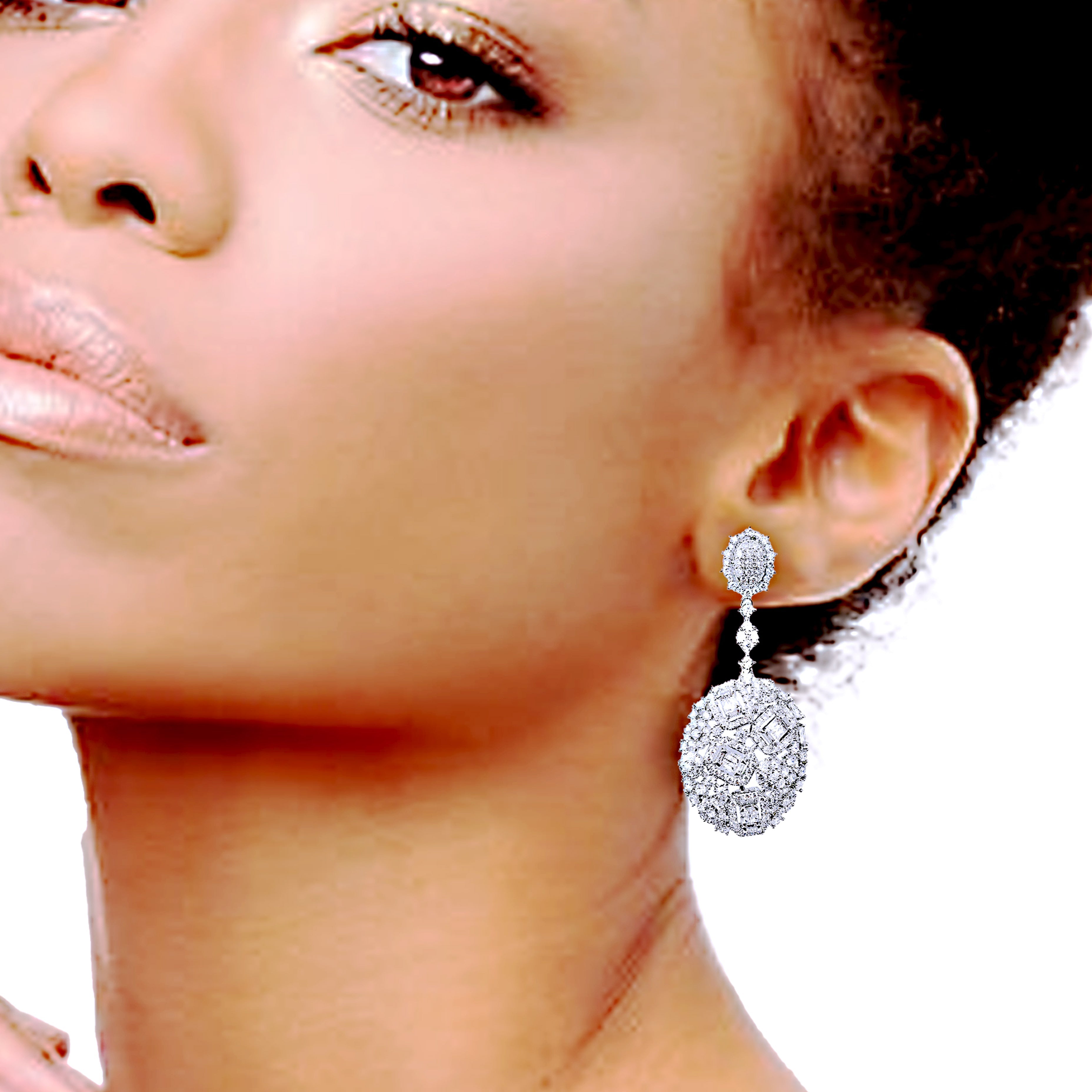 Close-up of a woman wearing sparkling silver earrings.