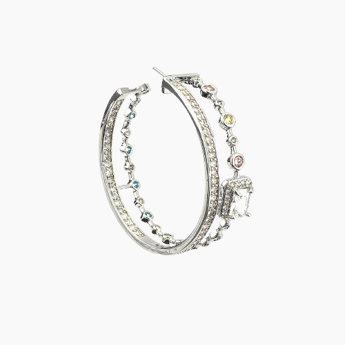 Elegant silver hoop earring with gemstones on a white background