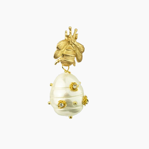Gold bee-shaped pendant on a white background