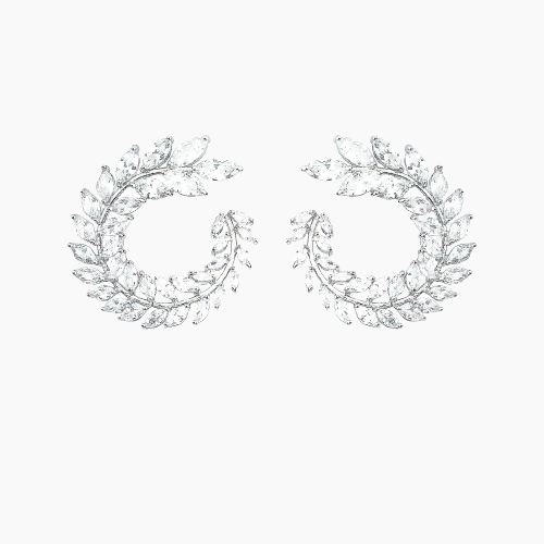 Pair of diamond earrings in the shape of laurel wreaths on a white background