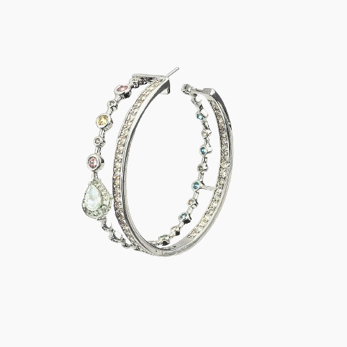 Pair of silver hoop earrings with gemstone accents on a white background