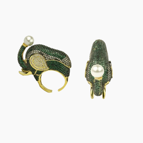 Decorative headband with green gemstones and pearl accents on a white background