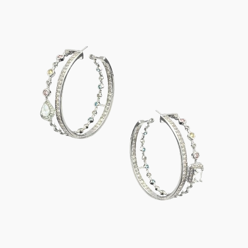 Pair of silver hoop earrings with gemstones on a white background
